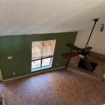 View to downstairs from loft bedroom.