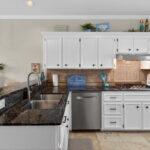 Granite Countertops and Tile accented backsplash