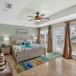 Big Primary Bedroom downstairs with access to deck