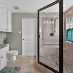 Large Tiled shower & Walk-in Closet