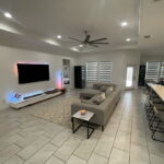 Motorized Indoor Shutters throughout the home that can be completely raised
