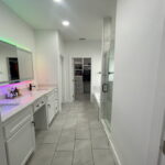 Primary Bathroom with Dual Vanity and Back Lit Mirror