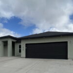 Front Elevation. Additional Parking in Drive-Way