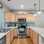 Kitchen offers plenty of counter and cabinet space.