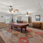 What used to be the 2-car garage is now a fabulous family/game room with doorway to the guest quarters.