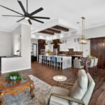 Coming up the staircase you'll be welcomed into the spacious living/dining/kitchen area ALL with water views!