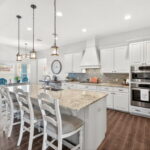 A kitchen that's easy to move around. Breakfast bar for additional seating.