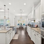 his kitchen is easy for several chefs to move around.