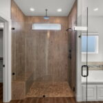 Walk-in shower and jetted tub.