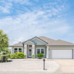 Beautiful one-story, 4 bedrooms, 3 baths with a dedicated office. Situated on a Corner lot.