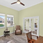 Dedicated office with double doors for privacy. This room could also be a play room or exercise room.