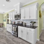 Gas cooking with stylish backsplash.