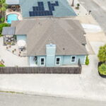 Aerial back view - maybe add a pool later?