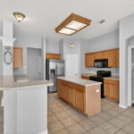 Spacious kitchen with room for several cooks. Nice walk-in pantry.