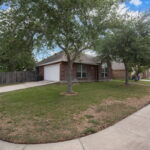 Corner lot location......side garage, fenced yard.