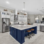 Incredible Custom Designed Cabinetry, 5 burner gas cooktop with plenty of lighting.
