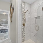 Jack & Jill Bath with walk-in tile shower.