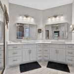 Owner's Bath Double Vanities - Stunning mirrors and lighting.