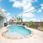Swimming pool with waterfall.