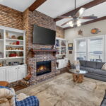 Living area with gas fireplace.