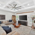 Beautiful tray ceiling with awesome ceiling fan.