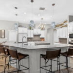 Oversized breakfast bar with designer lighting.