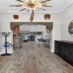 "Come In" Coastal Plank Porcelain Tile Flooring Throughout.