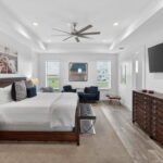 SECOND FLOOR - massive primary bedroom with room to move around and water views!
