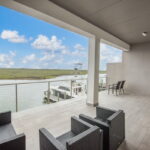 SECOND FLOOR - outdoor balcony off the living area with water views.