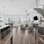 SECOND FLOOR - Living, Dining area, Kitchen with door out to the covered decking overlooking the water.