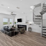 SECOND FLOOR - Living area with spiral staircase OR elevator to the 3rd floor.