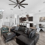 SECOND FLOOR - Living area, Dining Area, Kitchen with door out to the covered decking overlooking the water.