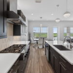 SECOND FLOOR - Kitchen with views out to the water.