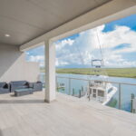 SECOND FLOOR - Outdoor balcony, tiled and water views!