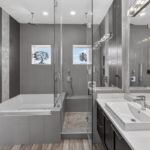 SECOND FLOOR - Primary Bath with jetted tub, walk-in shower and two sink area. GORGEOUS!