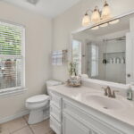 Hall bath with large walk-in shower.