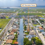 Aerial view looking towards the Gulf of America & the beach!