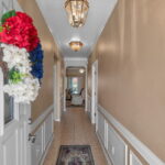 "Come In" Three bedrooms, 2 baths with an additional office/flex room.