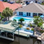 15969 Punta Espada Loop - North Padre Island...Covered Patio, Pool, Boat Slip and electric Lift. Just Awesome!