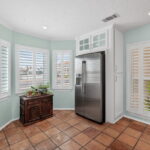 A water view from the kitchen windows - plantation shutters!