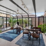 What a fun sunroom - with a door to the back yard.