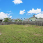 BACK YARD - Large for a garden, pool and dog run.