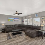 Open living area with door leading to the 1st floor covered patio.