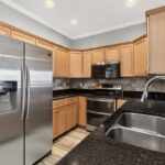 Stainless appliances - refrigerator conveys.