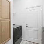 Laundry room - exit door to the 2 car garage.