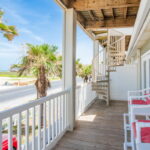 2nd floor covered patio - spiral staircase to the 3rd floor landing.