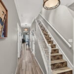 "Come In" unique tile accent stairway.