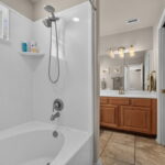 Primary bath from the primary bedroom. Garden tub and shower.